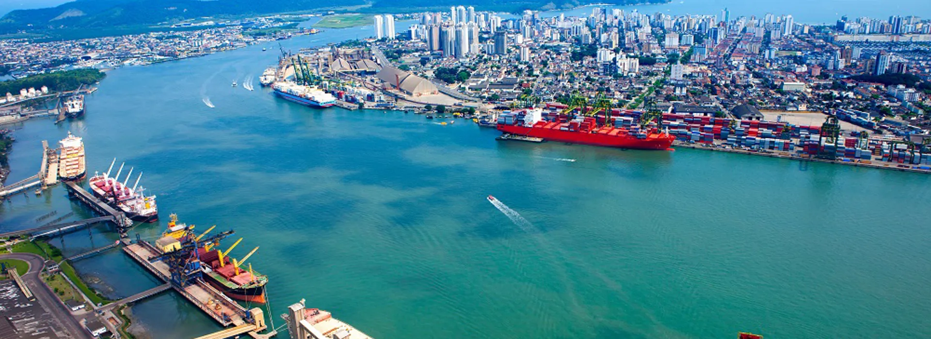 Aerial view of a busy port and river.