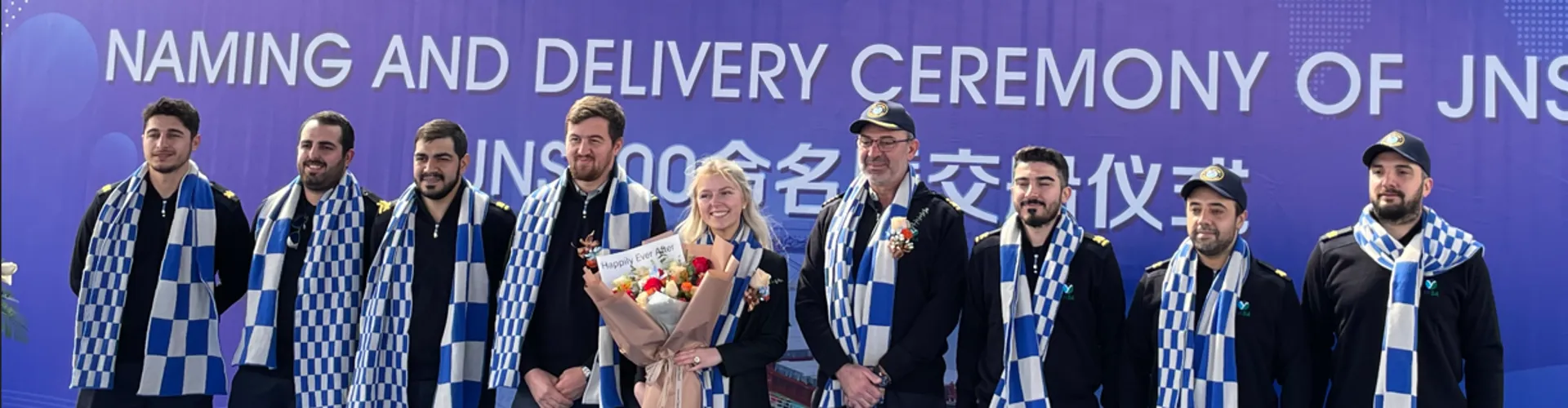 Group photo at a ship naming ceremony.