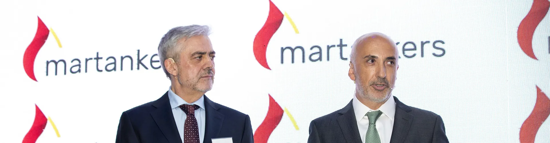 two men at the MARTANKERS 30Th Anniversary Party