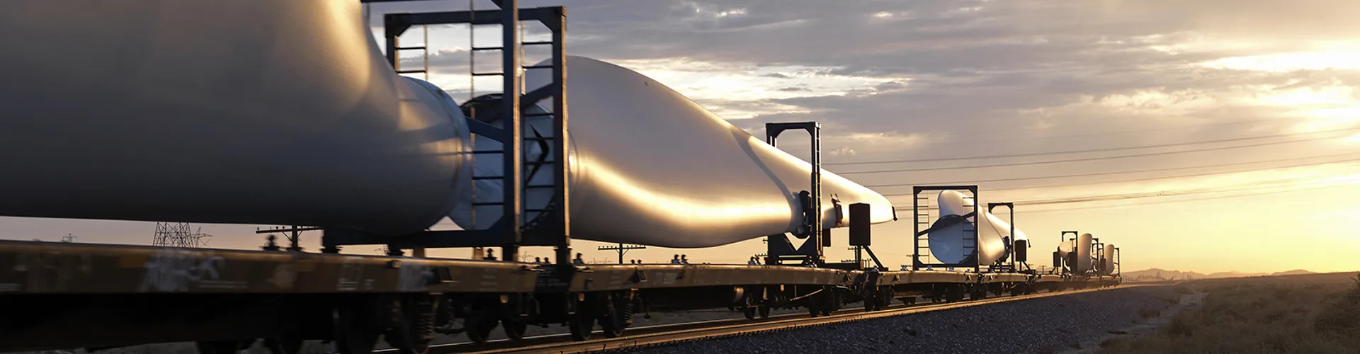 Wind turbine blades on train