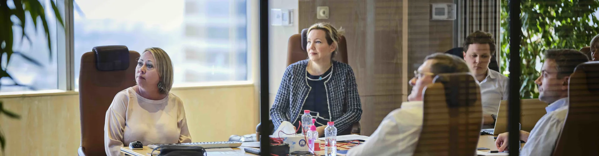 DOEL compliance team in a meeting