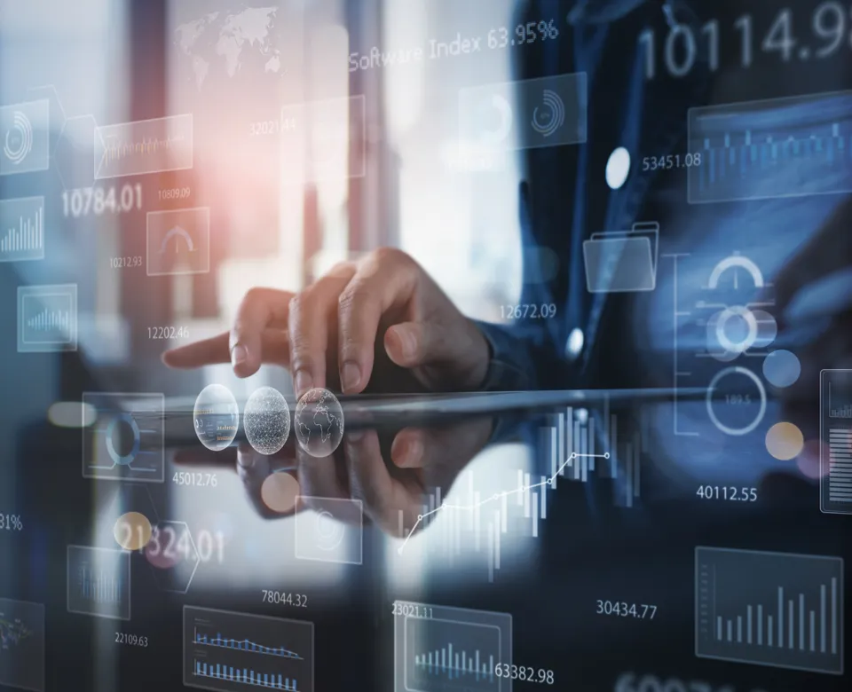 Close-up of hand interacting with a digital tablet displaying data visualizations (graphs, charts, figures).