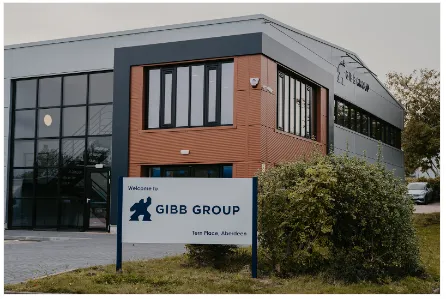 Modern building with Gibb Group sign outside.